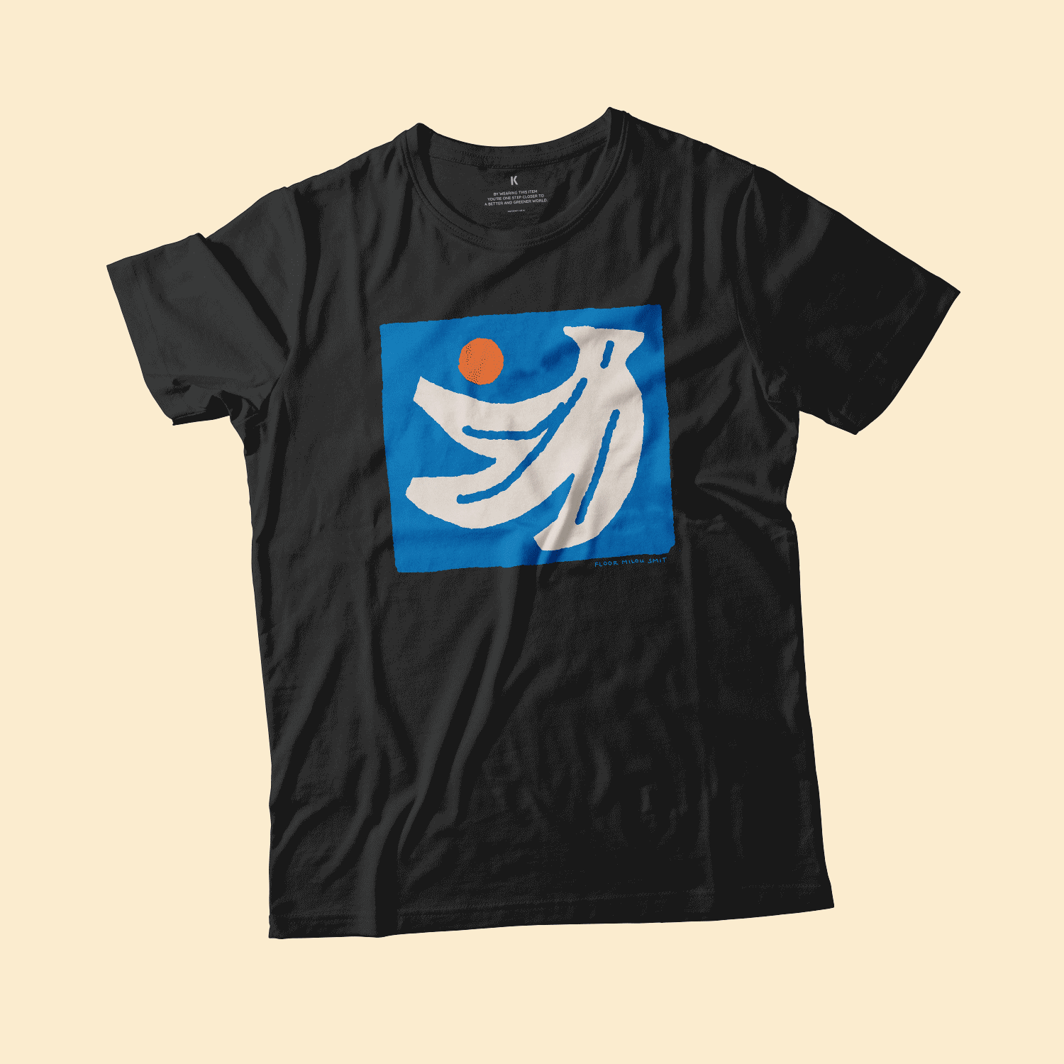 Gif of a black and heather grey t-shirt flat on cream background, looping. The print on the shirts are the same, an off-white hand of bananas with an orange circle next to them on a blue square background.